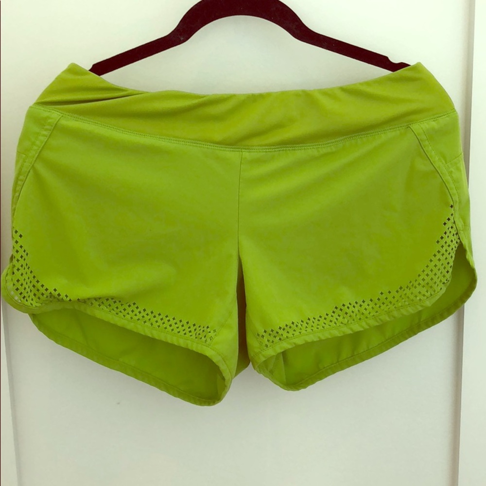 Athleta laser cut lime green shorts